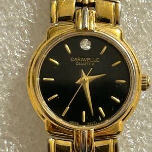 Bulova Caravelle Gold tone and Black Quartz Watch